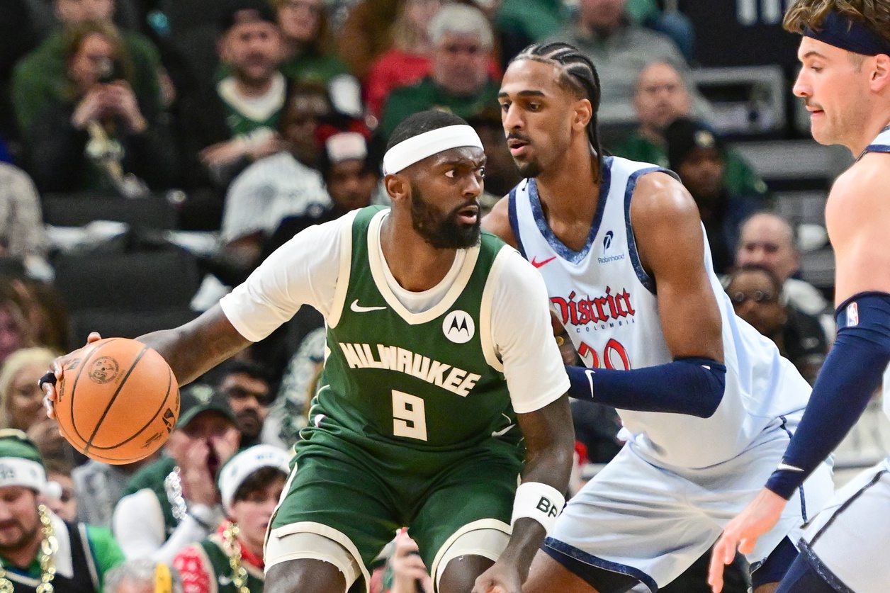 Milwaukee Bucks forward Bobby Portis (9) controls the ball against Washington Wizards center Alex Sarr (20)