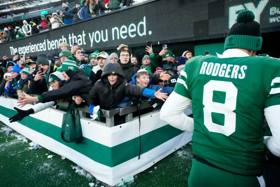 Young fans try to get the attention of New York Jets quarterback Aaron Rodgers (8) after the game, Sunday, December 22, 2024, in East Rutherford. © Kevin R. Wexler-NorthJersey.com / USA TODAY NETWORK via Imagn Images