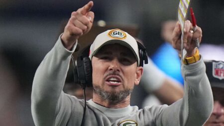 Jan 14, 2024; Arlington, Texas, USA; Green Bay Packers head coach Matt LaFleur reacts after his team scored a touchdown against the Dallas Cowboys during the third quarter in a 2024 NFC wild card game at AT&T Stadium. Mandatory Credit: Mark Hoffman-Imagn Images