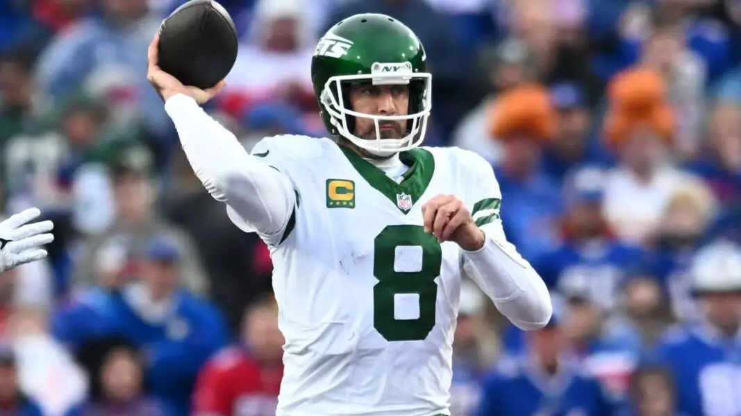 Dec 29, 2024; Orchard Park, New York, USA; New York Jets quarterback Aaron Rodgers (8) throws a pass in the third quarter against the Buffalo Bills at Highmark Stadium. Mandatory Credit: Mark Konezny-Imagn Images