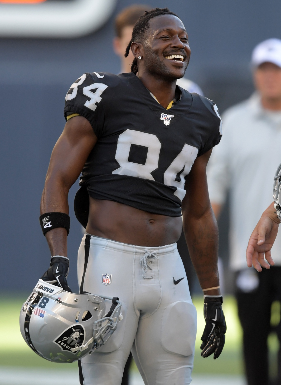 Aug 22, 2019; Winnipeg, Manitoba, CAN; Oakland Raiders wide receiver Antonio Brown (84) holds his helmet before a game against the Green Bay Packers  at Investors Group Field. Mandatory Credit: Kirby Lee-USA TODAY Sports