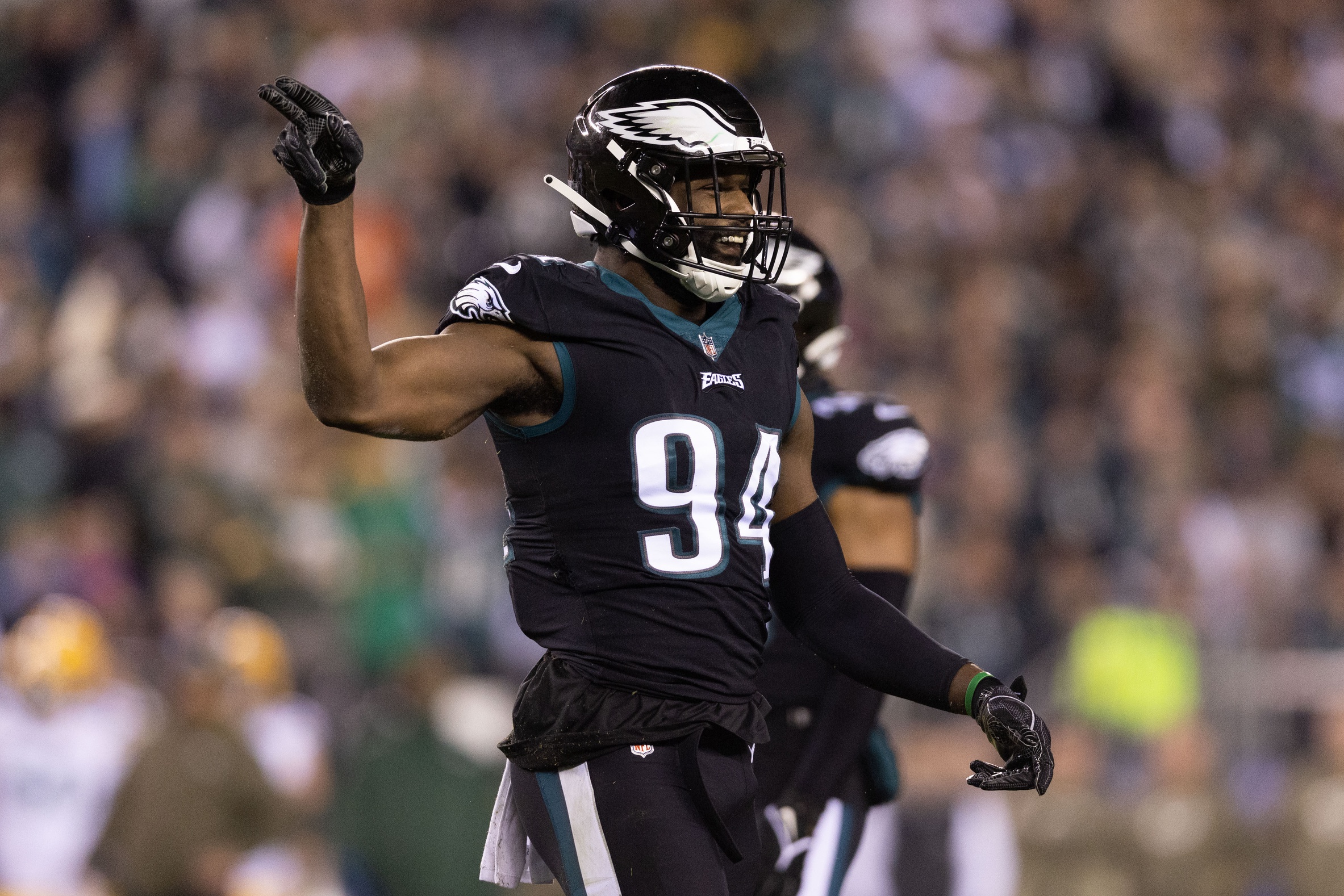 Nov 27, 2022; Philadelphia, Pennsylvania, USA; Philadelphia Eagles defensive end Josh Sweat (94) reacts to a tackle against the Green Bay Packers during the second quarter at Lincoln Financial Field. Mandatory Credit: Bill Streicher-Imagn Images