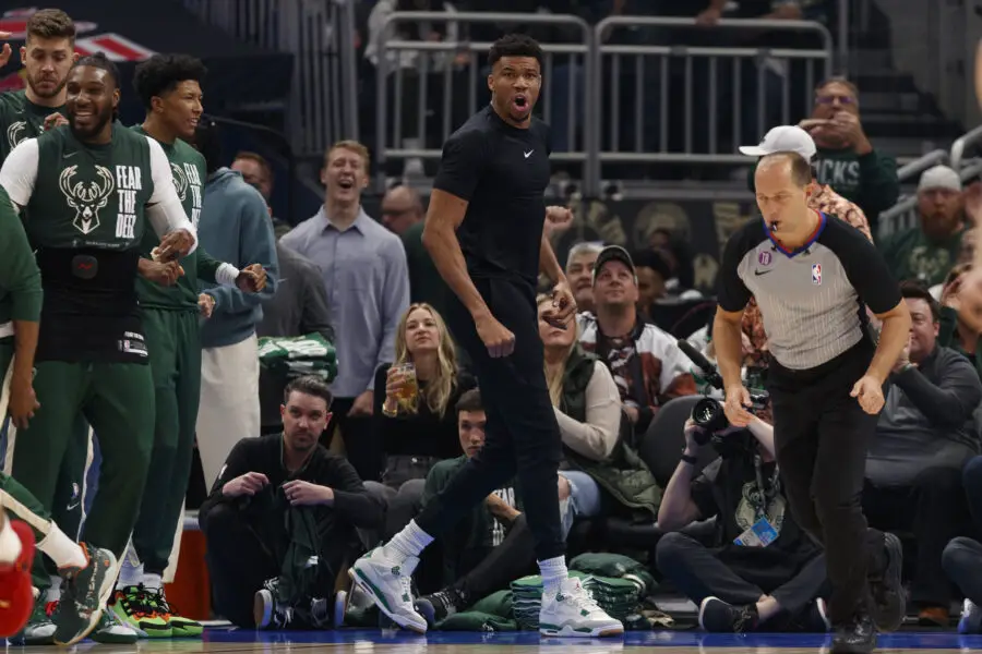 Apr 19, 2023; Milwaukee, Wisconsin, USA; Milwaukee Bucks forward Giannis Antetokounmpo cheers from the baseline during the first quarter against the Miami Heat during game two of the 2023 NBA Playoffs at Fiserv Forum. Mandatory Credit: Jeff Hanisch-Imagn Images