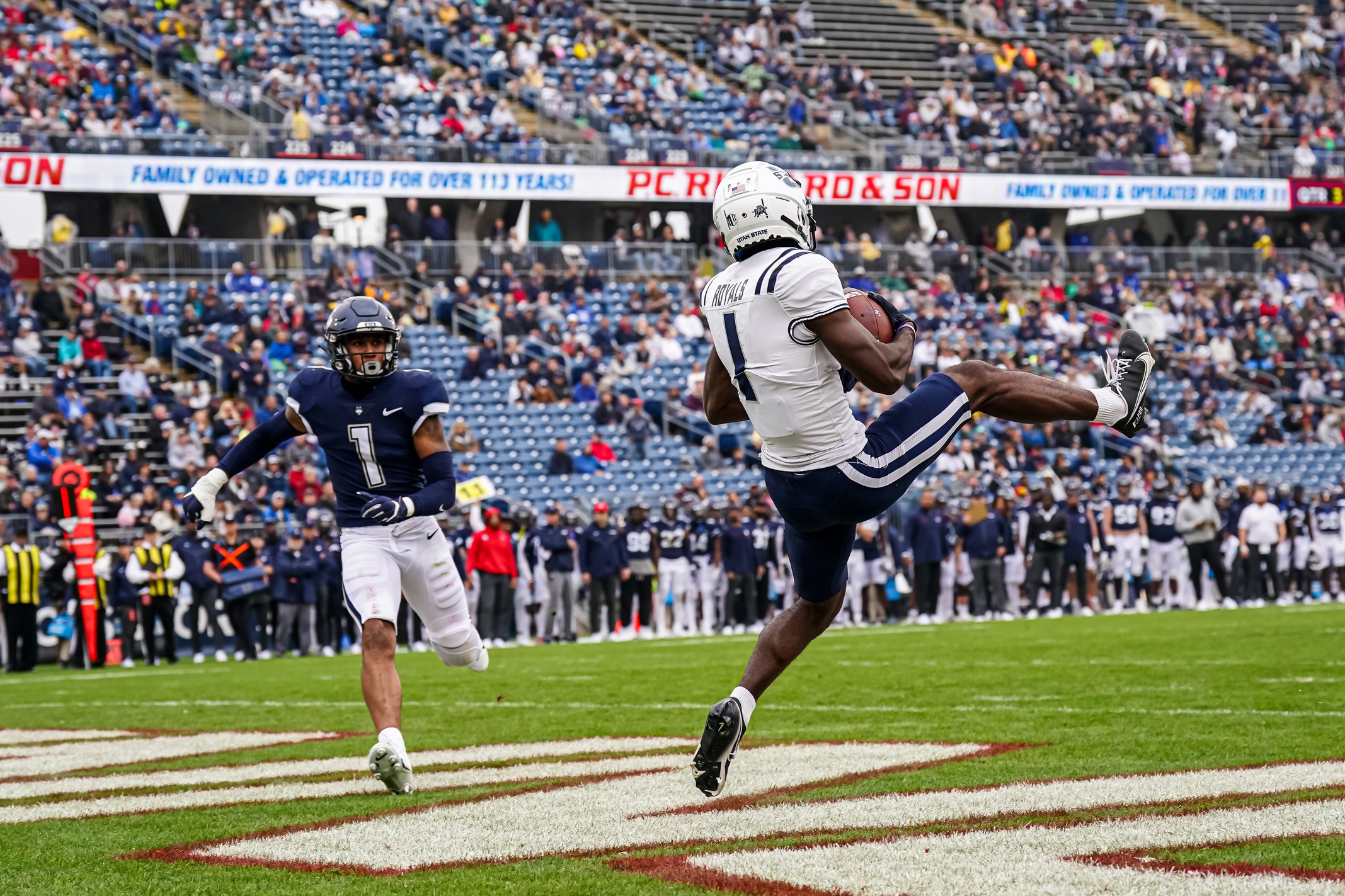 Sep 30, 2023; East Hartford, Connecticut, USA; Utah State Aggies wide receiver Jalen Royals (1) makes the touchdown catch against the UConn Huskies in the second half at Rentschler Field at Pratt & Whitney Stadium. Mandatory Credit: David Butler II-USA TODAY Sports Packers