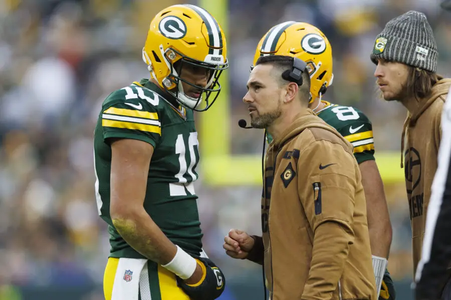 Nov 5, 2023; Green Bay, Wisconsin, USA; Green Bay Packers head coach Matt LaFleur talks with quarterback Jordan Love (10) during the second quarter against the Los Angeles Rams at Lambeau Field. Mandatory Credit: Jeff Hanisch-USA TODAY Sports