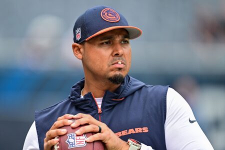 Chicago Bears general manager Ryan Poles plays catch