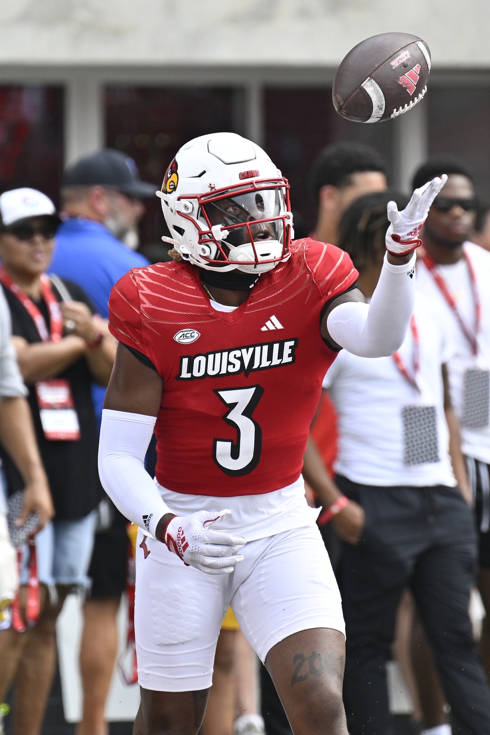 Aug 31, 2024; Louisville, Kentucky, USA; Louisville Cardinals defensive back Quincy Riley (3) catches the ball during warmups before facing off against the Austin Peay Governors at L&N Federal Credit Union Stadium. Mandatory Credit: Jamie Rhodes-Imagn Images Packers