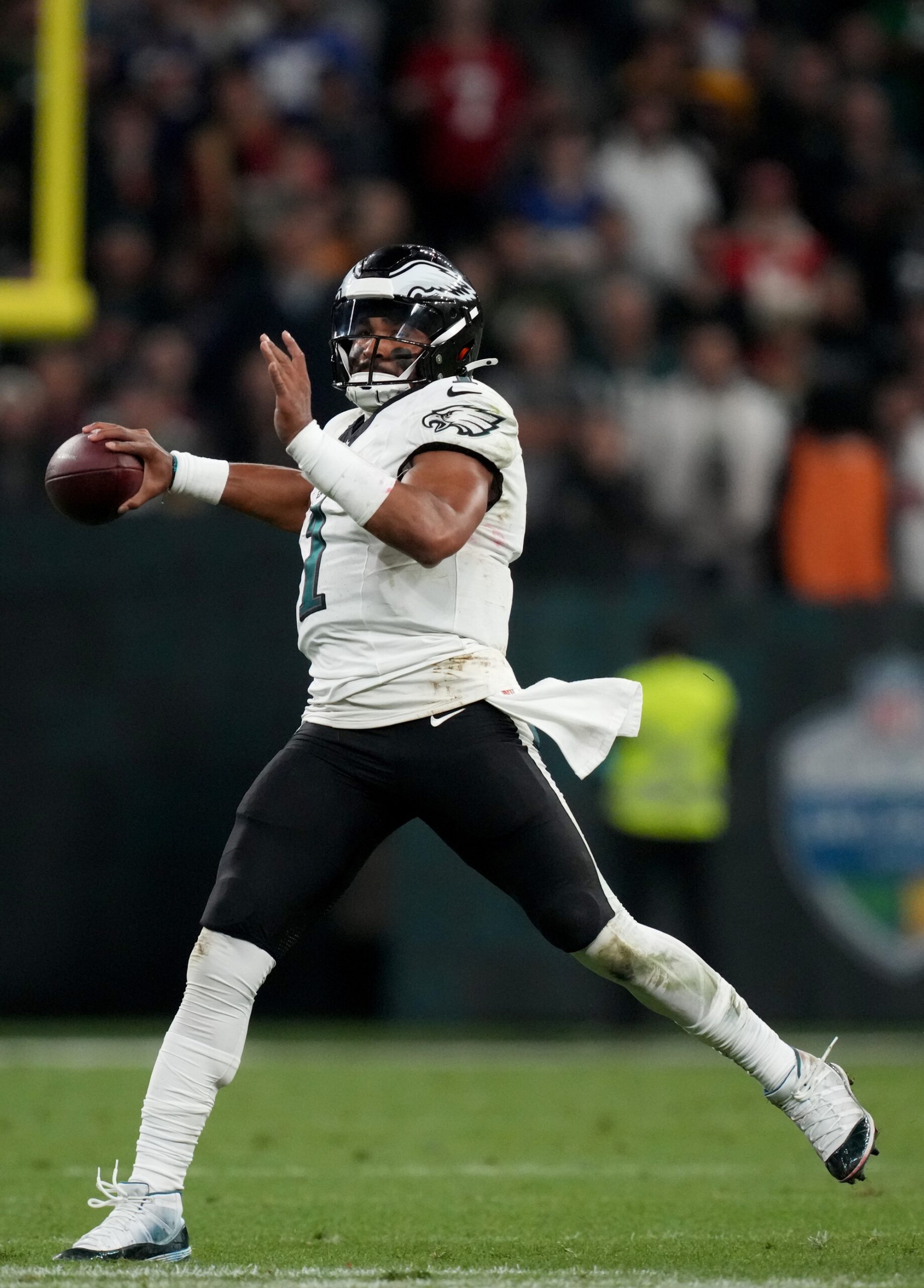 Sep 6, 2024; Sao Paulo, BRA; Philadelphia Eagles quarterback Jalen Hurts (1) scrambles during the first half against the Green Bay Packers at Neo Quimica Arena. Mandatory Credit: Kirby Lee-Imagn Images