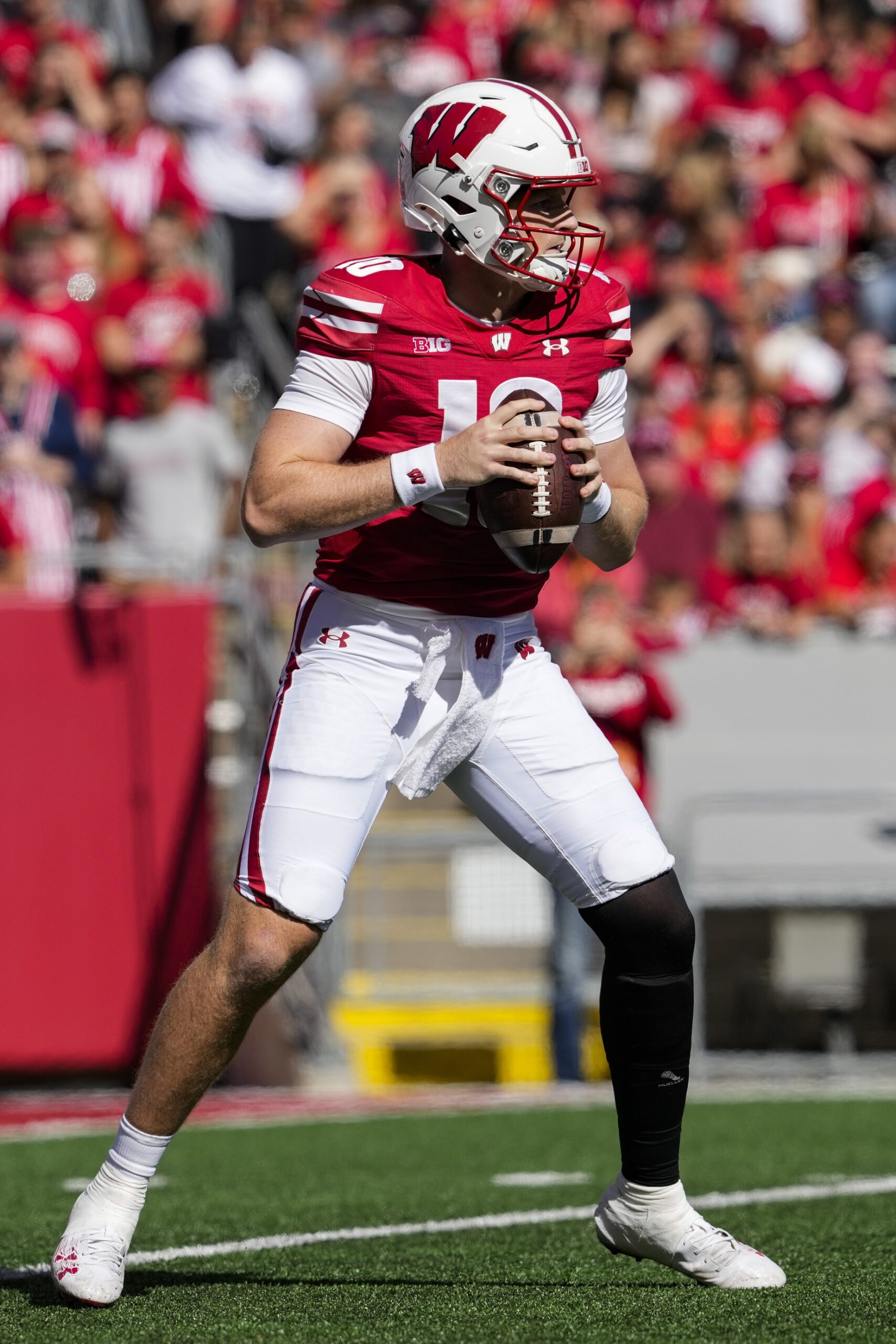 Sep 7, 2024; Madison, Wisconsin, USA; Wisconsin Badgers quarterback Tyler Van Dyke (10) during the game against the South Dakota Coyotes at Camp Randall Stadium. Mandatory Credit: Jeff Hanisch-Imagn Images