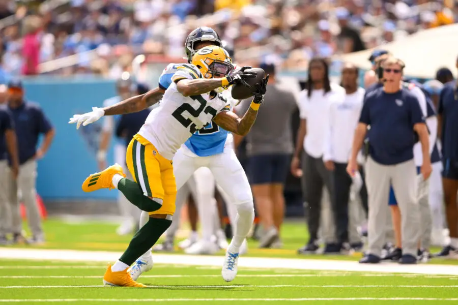 Sep 22, 2024; Nashville, Tennessee, USA; Green Bay Packers cornerback Jaire Alexander (23) intercepts a pass thrown by Tennessee Titans Will Levis (8) during the first half at Nissan Stadium. Mandatory Credit: Steve Roberts-Imagn Images