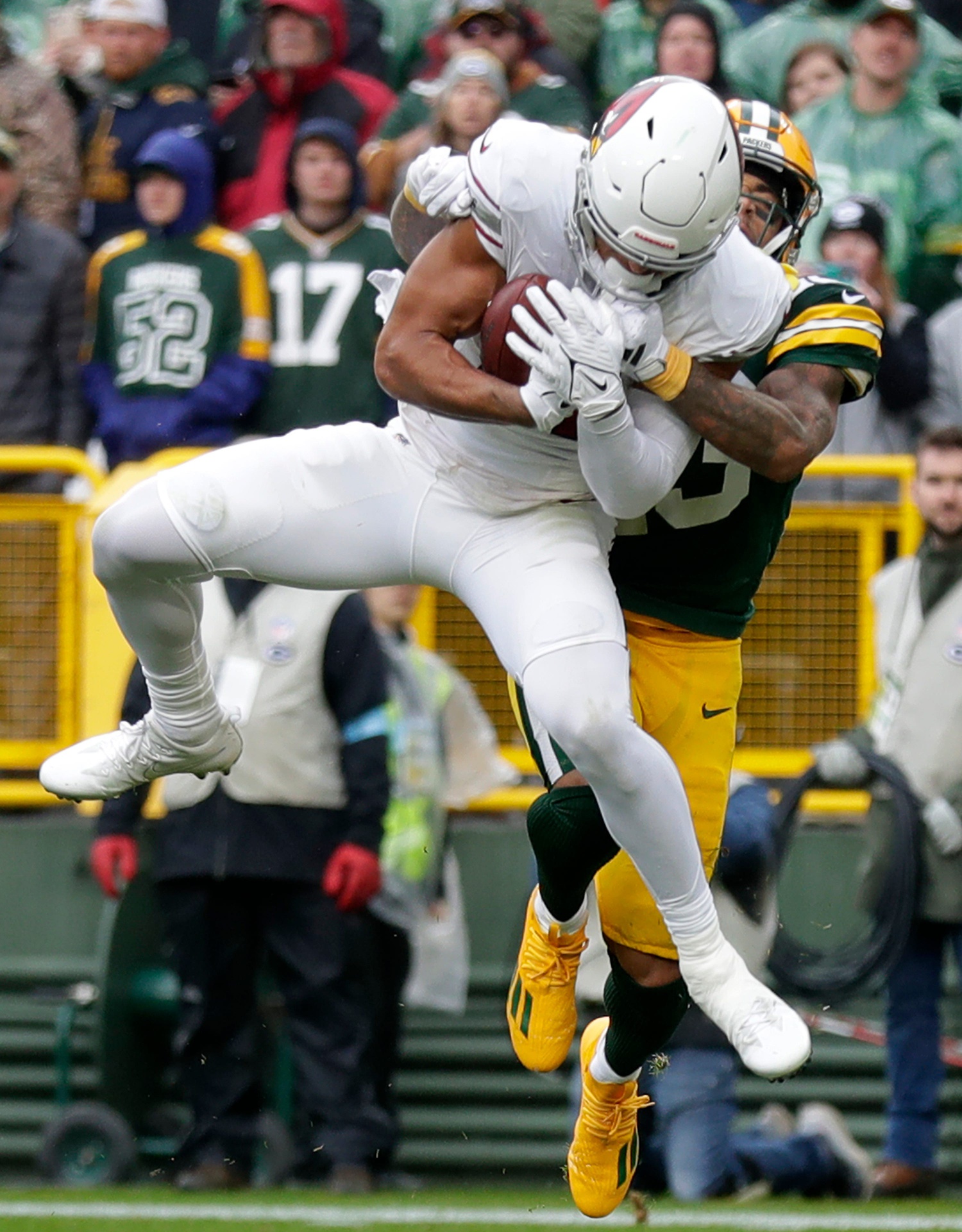 Arizona Cardinals wide receiver Michael Wilson (14) catches a second-quarter touchdown pass against Green Bay Packers cornerback Jaire Alexander (23)