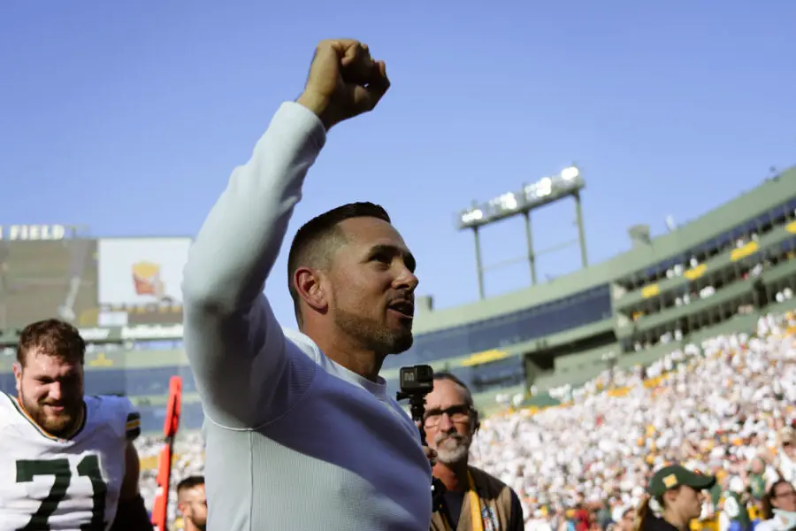 Oct 20, 2024; Green Bay, Wisconsin, USA; Green Bay Packers head coach Matt LaFleur celebrates while walking off the field following the game against the Houston Texans at Lambeau Field. Mandatory Credit: Jeff Hanisch-Imagn Images