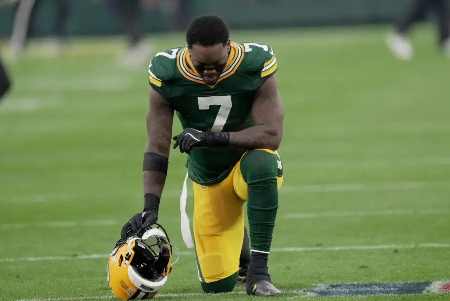 Green Bay Packers linebacker Quay Walker (7) takes a moment before their game against the San Francisco 49ers Sunday, November 24, 2024 at Lambeau Field in Green Bay, Wisconsin. © Mark Hoffman/Milwaukee Journal Sentinel / USA TODAY NETWORK via Imagn Images