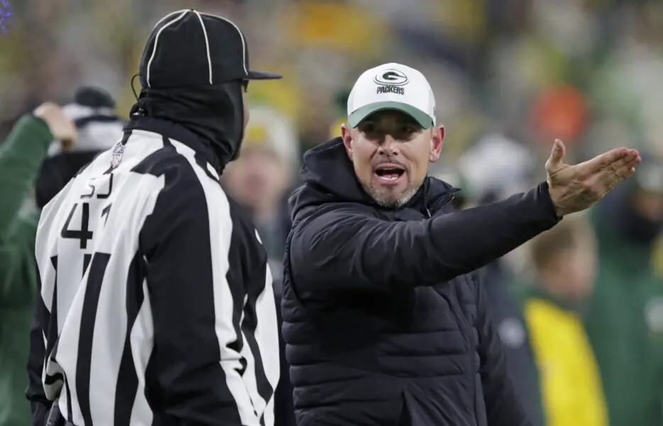 Nov 28, 2024; Green Bay, Wisconsin, USA; The Green Bay Packers head coach Matt LaFleur reacts to an official on a non call in the fourth quarter at Lambeau Field. Mandatory Credit: Dan Powers-Imagn Images