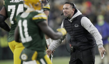 Dec 23, 2024; Green Bay, Wisconsin, USA; Green Bay Packers head coach Matt LaFleur celebrates a touchdown by running back Chris Brooks during the second quarter of their game against the New Orleans at Lambeau Field. Mandatory Credit: Mark Hoffman/Milwaukee Journal Sentinel/Imagn Images