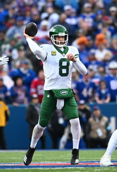 Dec 29, 2024; Orchard Park, New York, USA; New York Jets quarterback Aaron Rodgers (8) throws a pass in the third quarter against the Buffalo Bills at Highmark Stadium. Mandatory Credit: Mark Konezny-Imagn Images