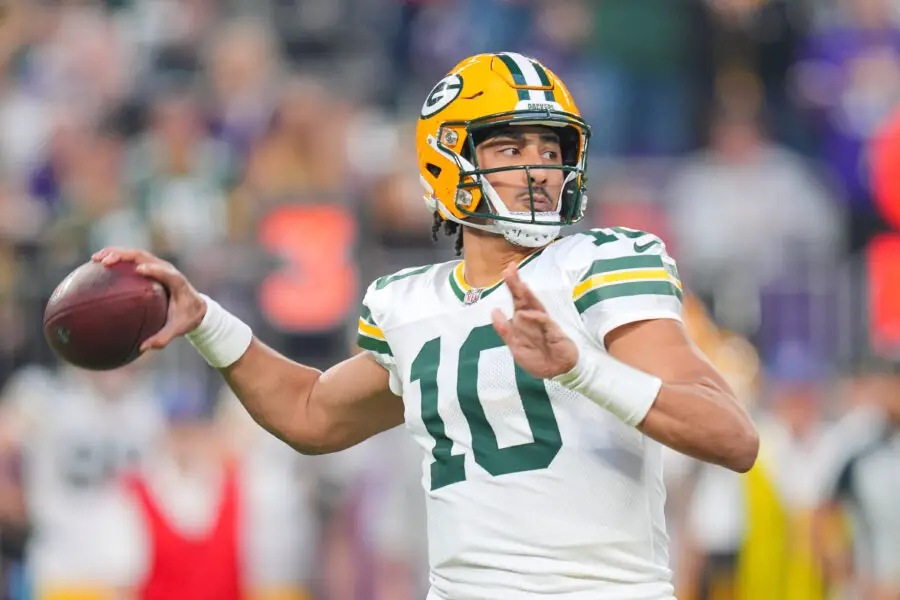 Dec 29, 2024; Minneapolis, Minnesota, USA; Green Bay Packers quarterback Jordan Love (10) passes against Minnesota Vikings in the first quarter at U.S. Bank Stadium. Mandatory Credit: Brad Rempel-Imagn Images