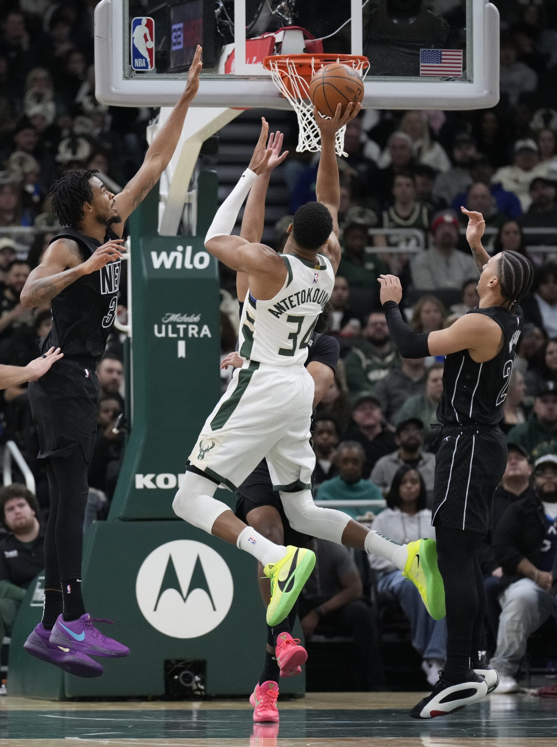 Jan 2, 2025; Milwaukee, Wisconsin, USA; Milwaukee Bucks forward Giannis Antetokounmpo (34) puts up a shot against the Brooklyn Nets in the second half at Fiserv Forum. Mandatory Credit: Michael McLoone-Imagn Images