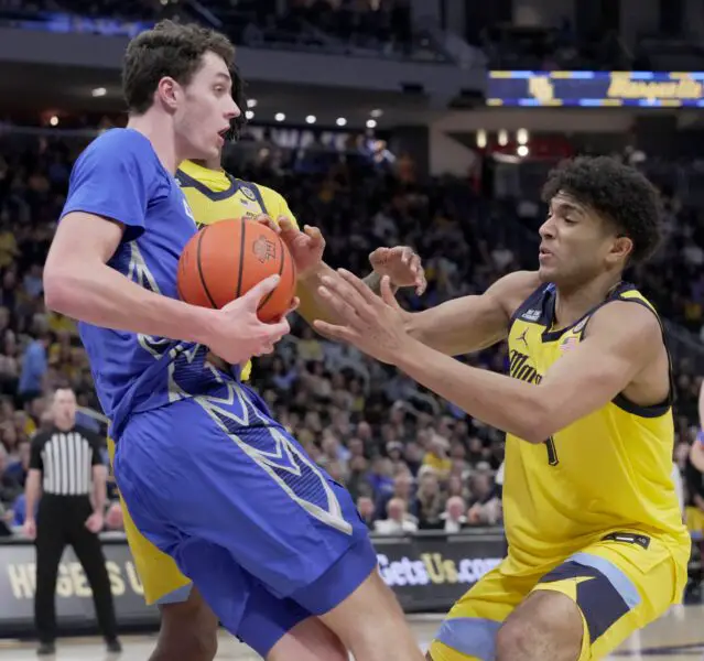 Marquette guard Stevie Mitchell vs Creighton center Ryan Kalkbenner