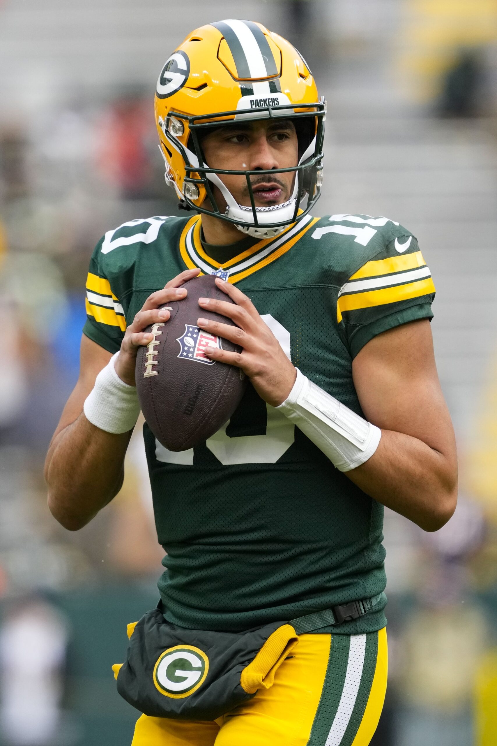 Jan 5, 2025; Green Bay, Wisconsin, USA; Green Bay Packers quarterback Jordan Love (10) throws a pass during warmups prior to the game against the Chicago Bears at Lambeau Field. Mandatory Credit: Jeff Hanisch-Imagn Images