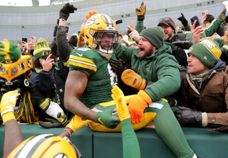 Green Bay Packers running back Josh Jacobs (8) celebrates after scoring a touchdown against the Chicago Bears on Sunday, January 5, 2024 at Lambeau Field in Green Bay, Wis. Wm. Glasheen USA TODAY NETWORK-Wisconsin