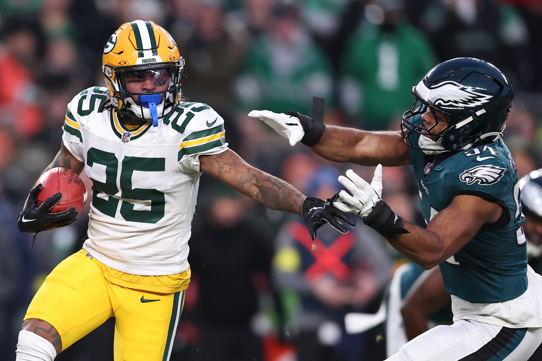 Jan 12, 2025; Philadelphia, Pennsylvania, USA; Green Bay Packers cornerback Keisean Nixon (25) returns a kick off against the Philadelphia Eagles during the first quarter in the NFC wild card game at Lincoln Financial Field. Mandatory Credit: Bill Streicher-Imagn Images