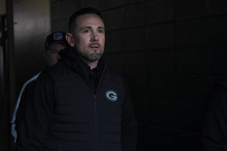 Jan 12, 2025; Philadelphia, Pennsylvania, USA; Green Bay Packers head coach Matt LaFleur walks to the field against the Philadelphia Eagles in an NFC wild card game at Lincoln Financial Field. Mandatory Credit: Eric Hartline-Imagn Images