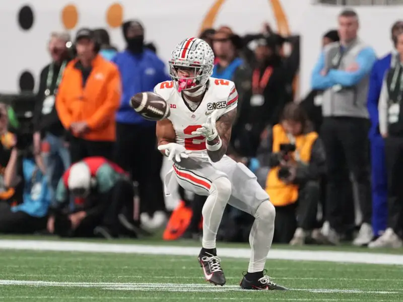 Jan 20, 2025; Atlanta, GA, USA; Ohio State Buckeyes wide receiver Emeka Egbuka (2) catches a pass against the Notre Dame Fighting Irish in the first half in the CFP National Championship college football game at Mercedes-Benz Stadium. Mandatory Credit: Dale Zanine-Imagn Images