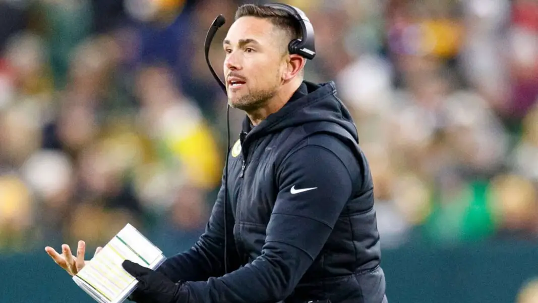 Nov 28, 2021; Green Bay, Wisconsin, USA; Green Bay Packers head coach Matt LaFleur reacts to a call during the second quarter against the Los Angeles Rams at Lambeau Field. Mandatory Credit: Jeff Hanisch-Imagn Images