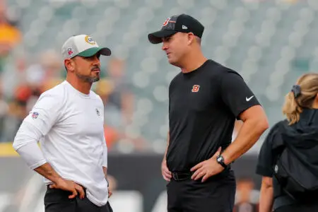 Aug 11, 2023; Cincinnati, Ohio, USA; Green Bay Packers head coach Matt LaFleur talks with Bengals head coach Zac Taylor during warmups prior to the game at Paycor Stadium. Mandatory Credit: Katie Stratman-Imagn Images