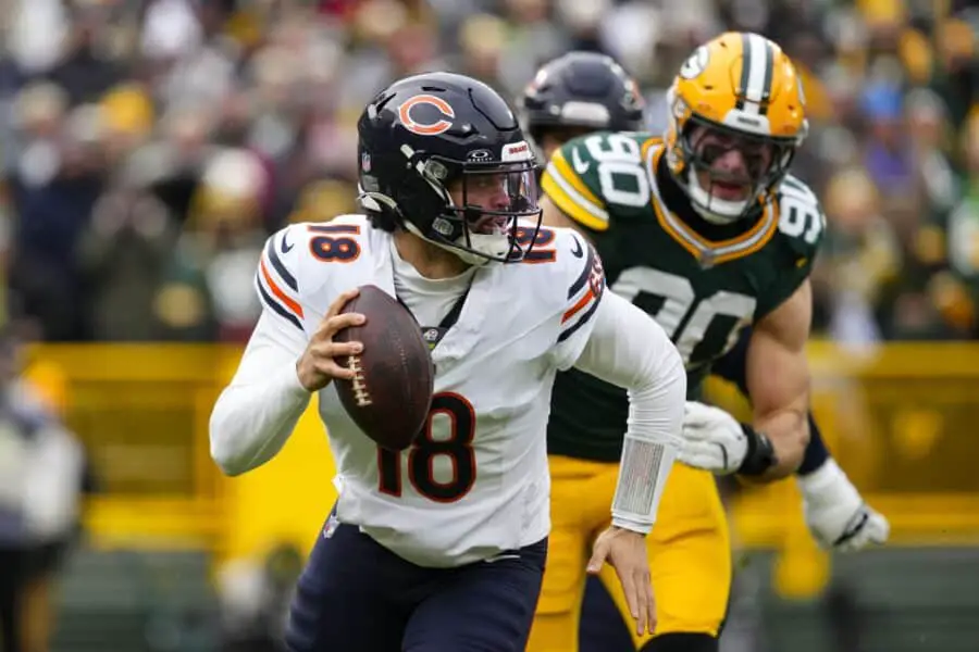 Bears get terrible news on one of Caleb Williams’ playmakers ahead of Packers clash Chicago Bears quarterback Caleb Williams (18) scrambles away from pressure applied by Green Bay Packers defensive lineman Lukas Van Ness (90)