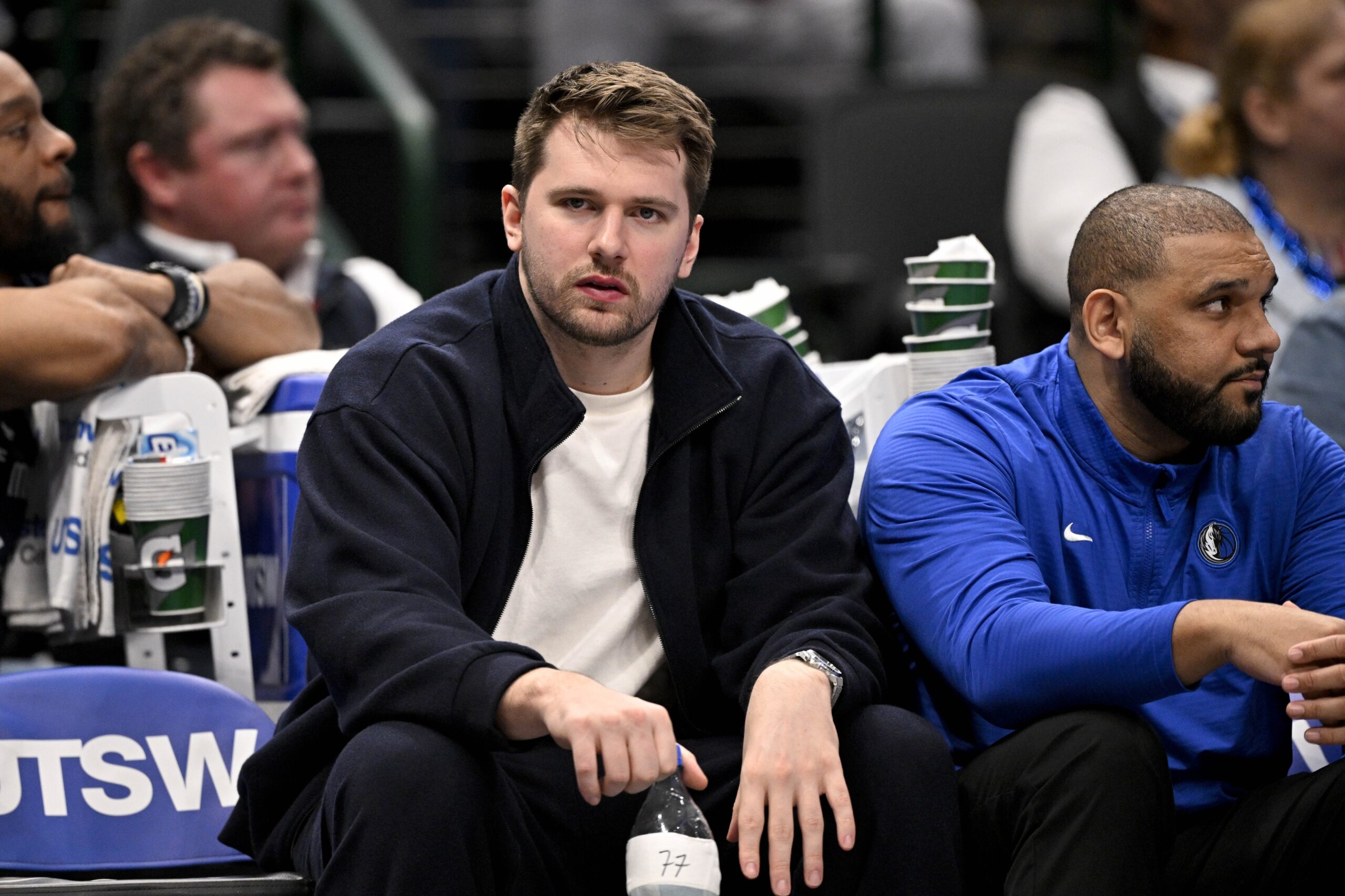 Jan 12, 2025; Dallas, Texas, USA; Dallas Mavericks guard Luka Doncic (77) reacts from the team bench during the second half of the game against the Denver Nuggets at the American Airlines Center. Mandatory Credit: Jerome Miron-Imagn Images Packers