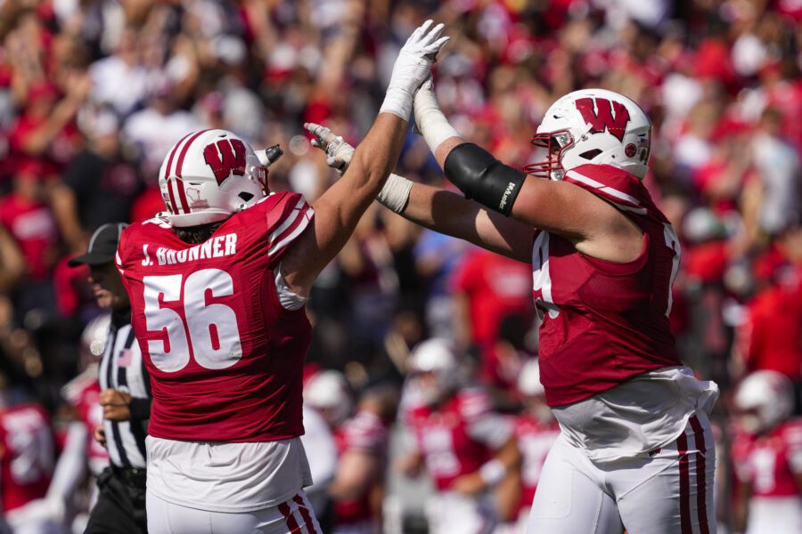 Former Badgers' four-star starting guard transfers to B1G rival Indiana 1 Wisconsin Badgers offensive linemen Joe Brunner (56) and Jack Nelson (79) celebrate