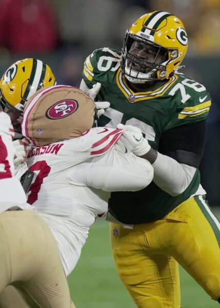 Green Bay Packers offensive tackle Kadeem Telfort (76) blocks San Francisco 49ers defensive tackle Evan Anderson (69) during the fourth quarter of their game Sunday, November 24, 2024 at Lambeau Field in Green Bay, Wisconsin. © Mark Hoffman/Milwaukee Journal Sentinel / USA TODAY NETWORK via Imagn Images