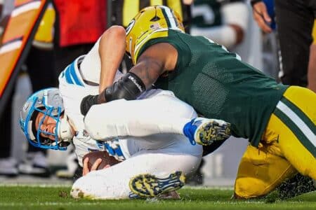 Detroit Lions quarterback Jared Goff is sacked by Green Bay Packers defensive end Micah Parsons.