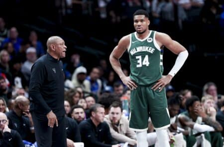 Doc Rivers pushes back on “no-contact” narrative after Giannis Antetokounmpo injury Mar 1, 2025; Dallas, Texas, USA; Milwaukee Bucks head coach Doc Rivers speaks to Milwaukee Bucks forward Giannis Antetokounmpo (34) during the second half against the Dallas Mavericks at American Airlines Center. Mandatory Credit: Kevin Jairaj-Imagn Images
