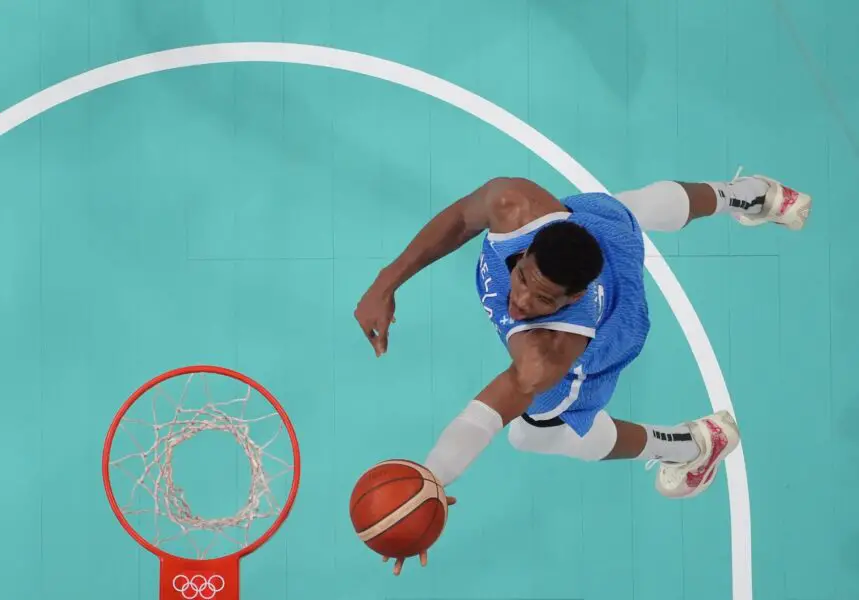 Jul 30, 2024; Villeneuve-d'Ascq, France; Greece small forward Giannis Antetokounmpo (34) shoots against Spain in a men's basketball group stage match during the Paris 2024 Olympic Summer Games at Stade Pierre-Mauroy. Mandatory Credit: John David Mercer-Imagn Images