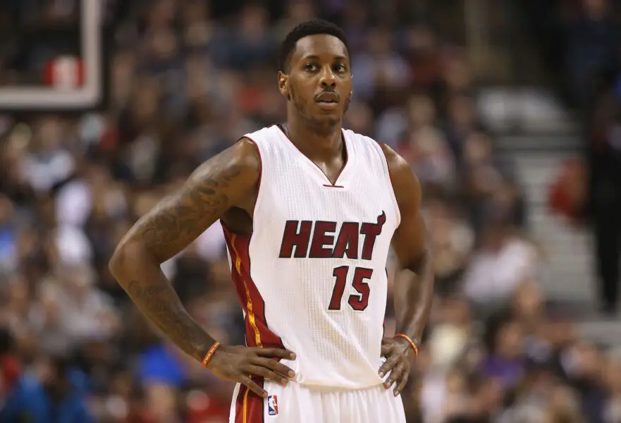 Mar 13, 2015; Toronto, Ontario, CAN; Miami Heat guard Mario Chalmers (15) during their game against the Toronto Raptors at Air Canada Centre. The Raptors beat the Heat 102-92. Mandatory Credit: Tom Szczerbowski-Imagn Images