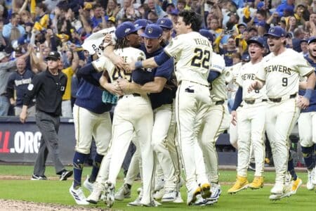 Milwaukee Brewers: Ranking the NL Central teams in January 2026 Oct 11, 2025; Milwaukee, Wisconsin, USA; Milwaukee Brewers left fielder Christian Yelich (22) and pitcher Abner Uribe (45) and pitcher Trevor Megill (29) and teammates celebrate after defeating the Chicago Cubs during game five of the NLDS round for the 2025 MLB playoffs at American Family Field. Mandatory Credit: Michael McLoone-Imagn Images