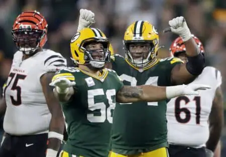 Green Bay Packers linebacker Isaiah McDuffie (58) and defensive tackle Karl Brooks (94)