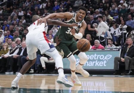 Giannis Antetokounmpo posts historic stat line in Bucks season debut Oct 22, 2025; Milwaukee, Wisconsin, USA; Milwaukee Bucks forward Giannis Antetokounmpo (34) drives against Washington Wizards forward Khris Middleton (22) in the first half at Fiserv Forum. Mandatory Credit: Michael McLoone-Imagn Images