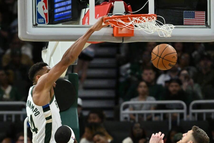 Oct 14, 2025; Milwaukee, Wisconsin, USA; Milwaukee Bucks forward Giannis Antetokounmpo (34) dunks against the Oklahoma City Thunder during the second half at Fiserv Forum. Mandatory Credit: Patrick Gorski-Imagn Images