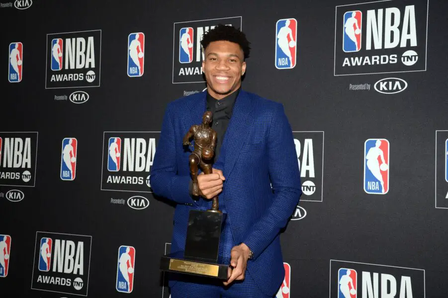 June 24, 2019; Los Angeles, CA, USA; Milwaukee Bucks forward Giannis Antetokounmpo poses with his NBA most valuable player award at the 2019 NBA Awards show at Barker Hanger. Mandatory Credit: Gary A. Vasquez-Imagn Images