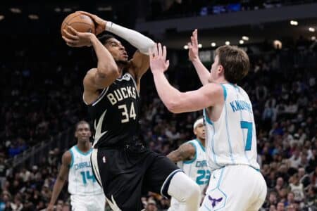 Giannis Antetokounmpo, Kyle Kuzma power Bucks to overtime win over Hornets and hometown rookie Nov 14, 2025; Milwaukee, Wisconsin, USA; Milwaukee Bucks forward Giannis Antetokounmpo (34) shoots against Charlotte Hornets guard Kon Knueppel (7) during overtime at Fiserv Forum. Mandatory Credit: Jeff Hanisch-Imagn Images