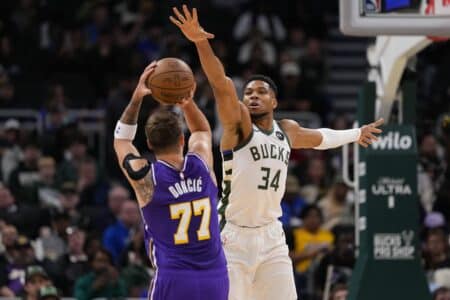 Bill Simmons suggests hypothetical Giannis Antetokounmpo-for-Luka Doncic blockbuster ahead of trade deadline Nov 15, 2025; Milwaukee, Wisconsin, USA; Milwaukee Bucks forward Giannis Antetokounmpo (34) defends Los Angeles Lakers guard Luka Doncic (77) during the first quarter at Fiserv Forum. Mandatory Credit: Jeff Hanisch-Imagn Images