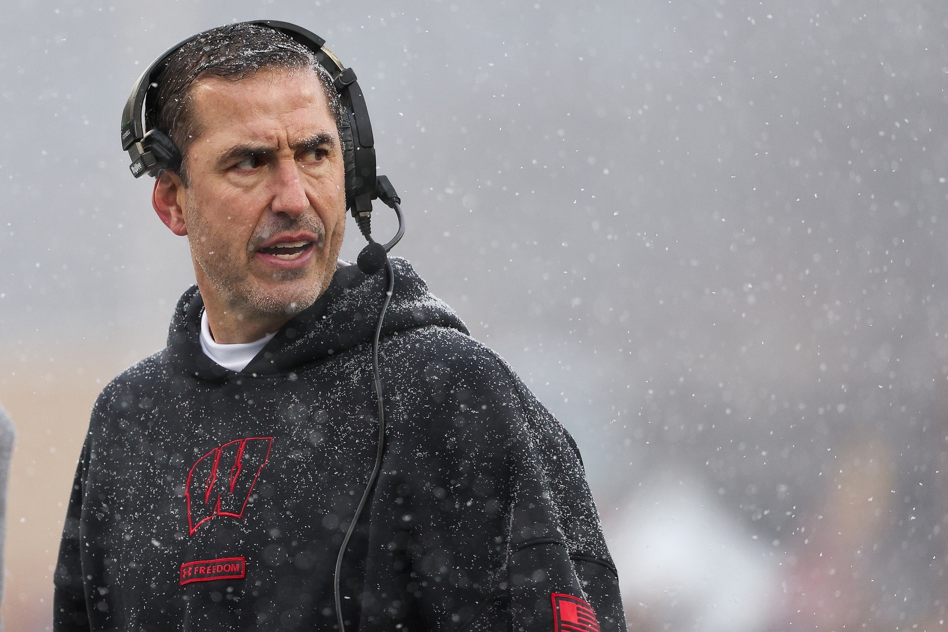 Nov 29, 2025; Minneapolis, Minnesota, USA; Wisconsin Badgers head coach Luke Fickell looks on during the first half against the Minnesota Golden Gophers at Huntington Bank Stadium. Mandatory Credit: Matt Krohn-Imagn Images