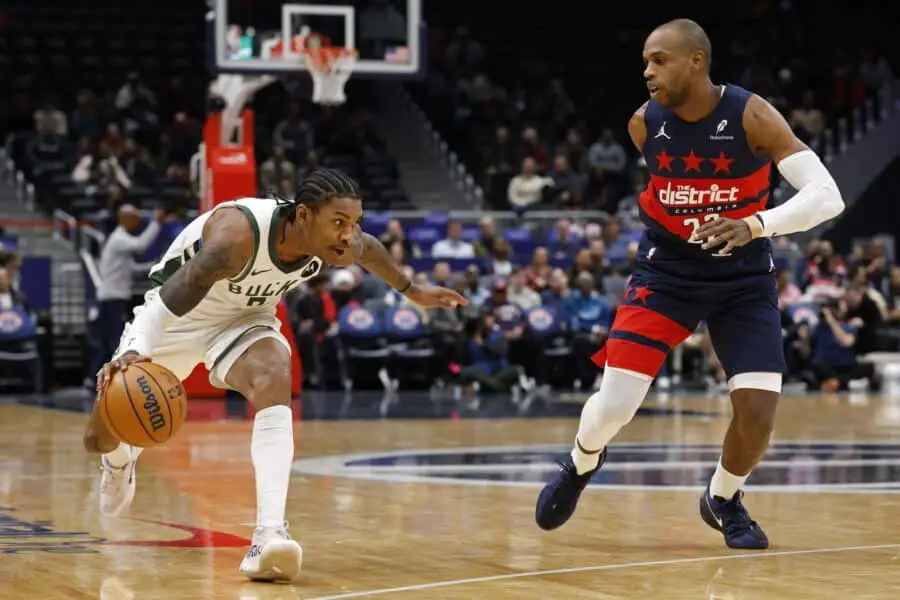 Kevin Porter Jr. is already justifying Bucks fans' excitement over long-awaited return 1 Milwaukee Bucks guard Kevin Porter Jr. (7) dribbles the ball as Washington Wizards forward Khris Middleton (22) defends.