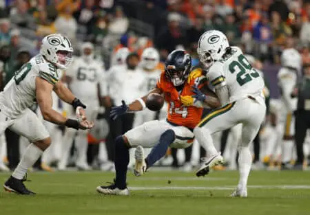 “Stay On That Side” Packers Starter Calls Out Famous Green Bay Twitter (X) Page For Insulting Remarks After Loss To Broncos Dec 14, 2025; Denver, Colorado, USA; Denver Broncos wide receiver Courtland Sutton (14), Green Bay Packers safety Xavier McKinney (29) and Green Bay Packers defensive end Lukas van Ness (90) battle for control of a loose ball during the fourth quarter at Empower Field at Mile High. Mandatory Credit: Isaiah J. Downing-Imagn Images