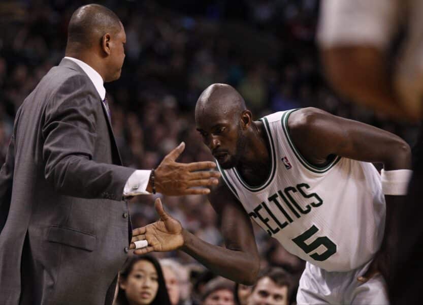 Bucks Doc Rivers key in restoring relationship between KG and the Timberwolves 1 Feb 01, 2013; Boston, MA, USA; Boston Celtics power forward Kevin Garnett (5) and head coach Doc Rivers share a hand-shake during a break in the action against the Orlando Magic in the second half at the TD Garden. The Celtics defeated the Orlando Magic 97-84. Mandatory Credit: David Butler II-Imagn Images