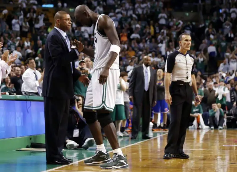 May 3, 2013; Boston, MA, USA; Boston Celtics center Kevin Garnett (5) shakes hands with head coach Doc Rivers in the final seconds of play against the New York Knicks in game six of the first round of the 2013 NBA Playoffs at TD Garden. The New York Knicks defeated the Celtics 88-80. Mandatory Credit: David Butler II-Imagn Images